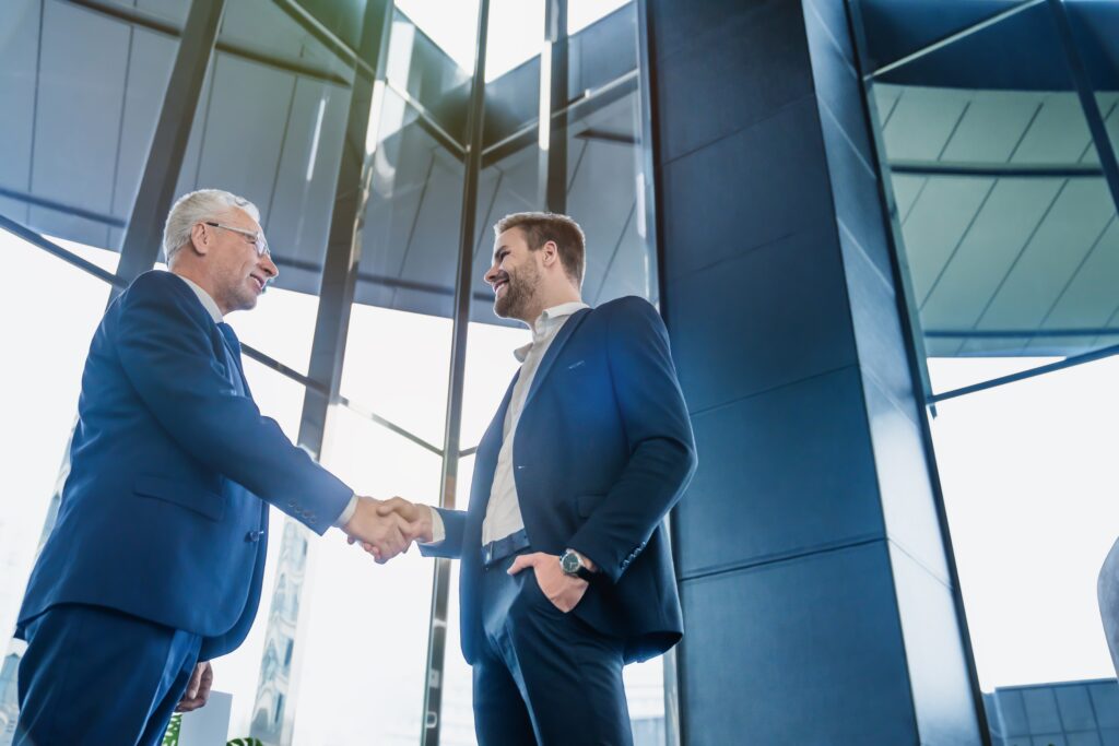 two business people meeting for direct sales deal